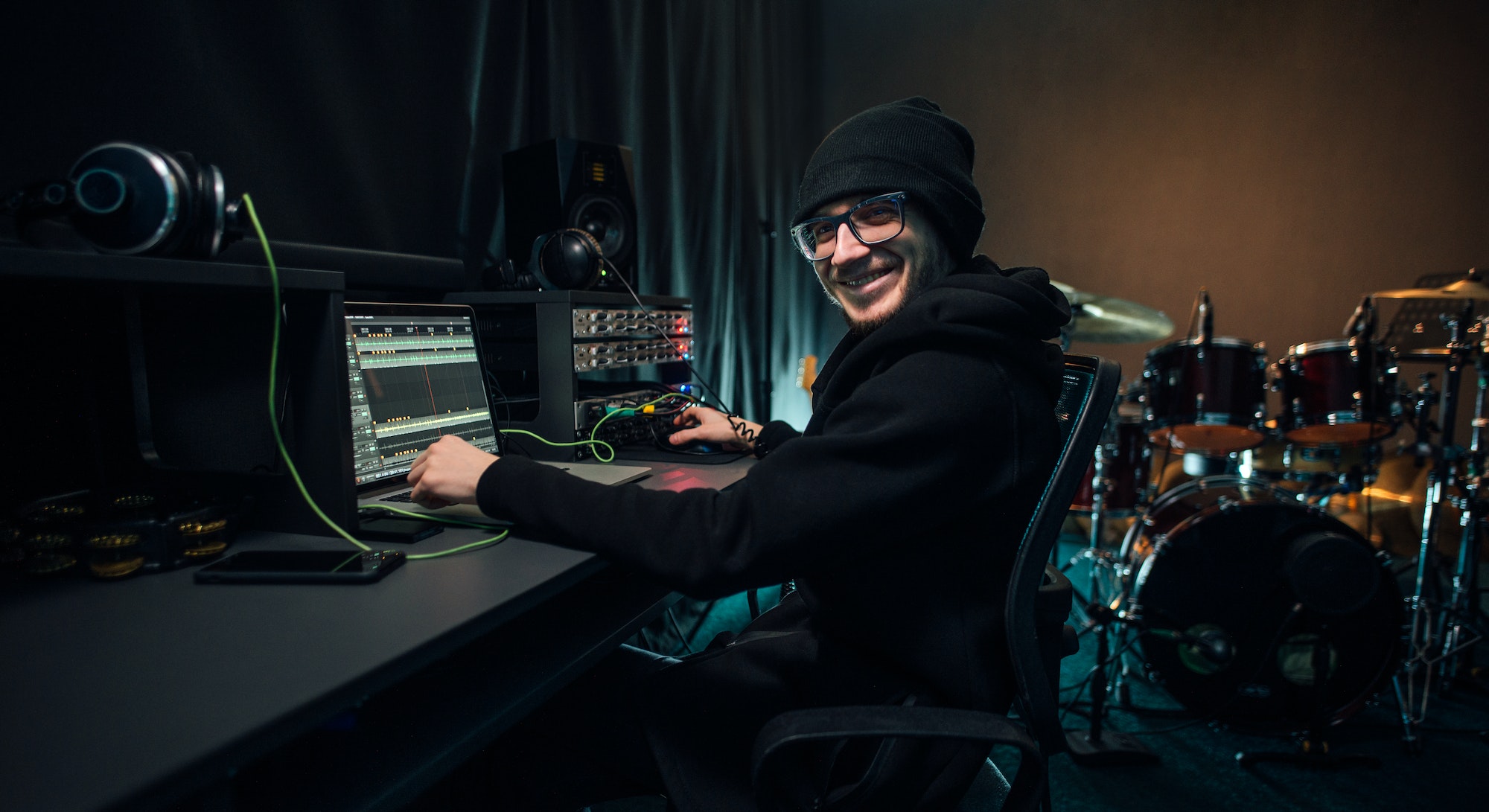 a-sound-engineer-uses-a-mixing-board-and-software-to-create-audio-track-.jpg